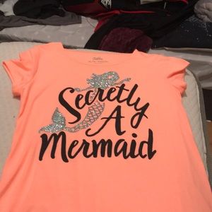 A girl shirt peach color size 14/16